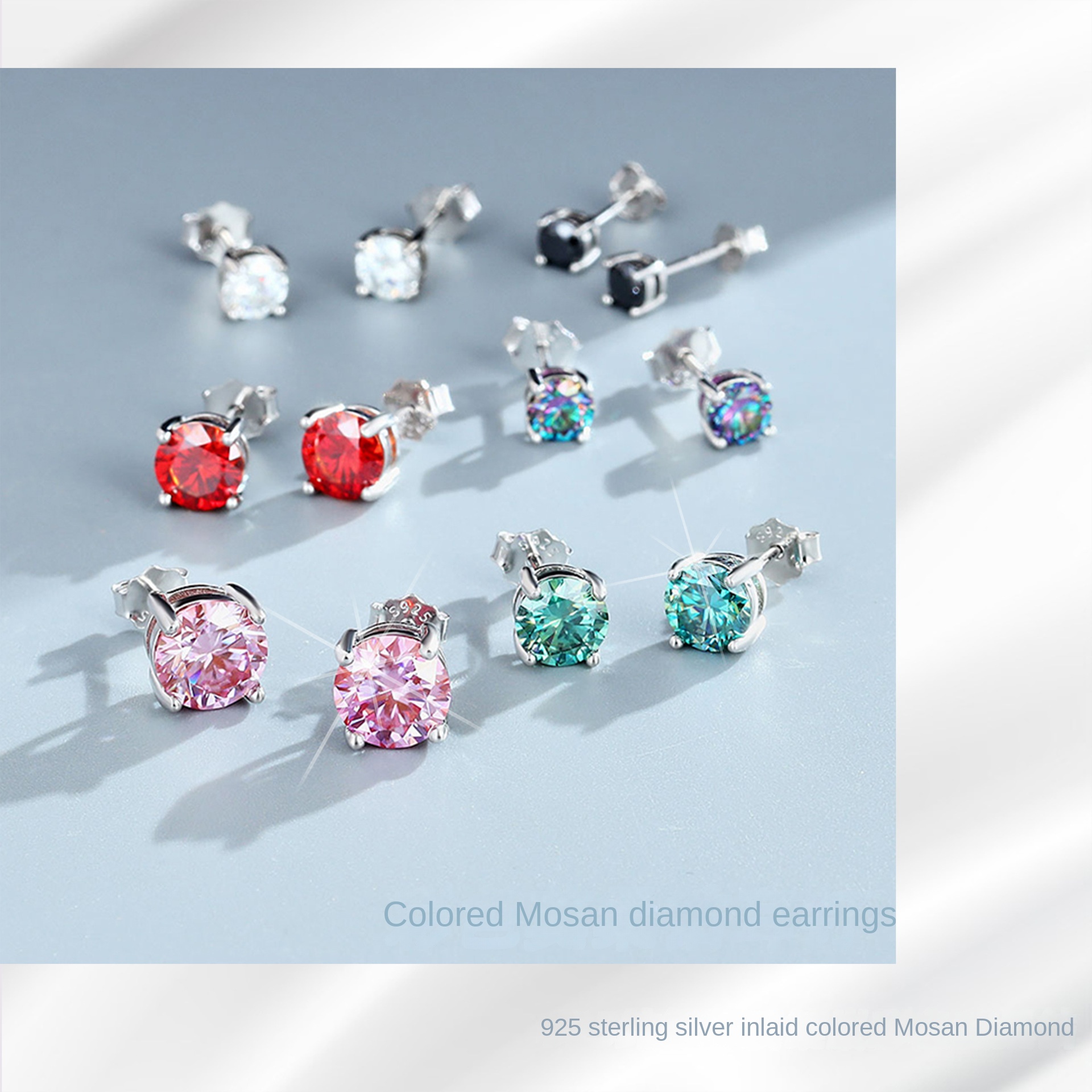 Four jaw Mossan stud earrings