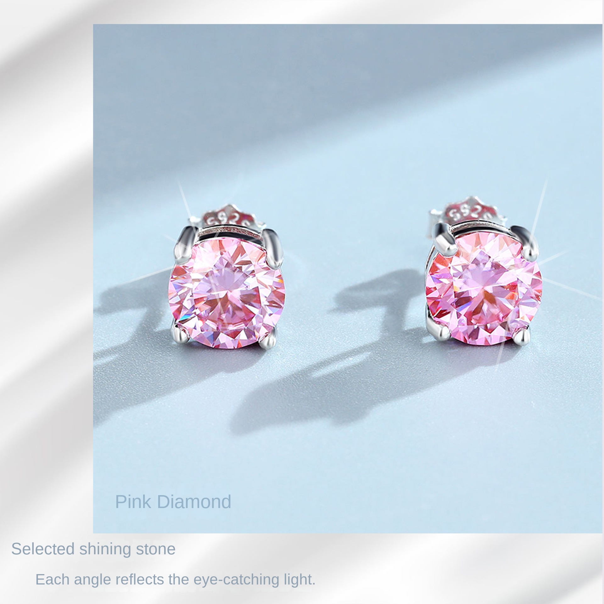 Four jaw Mossan stud earrings