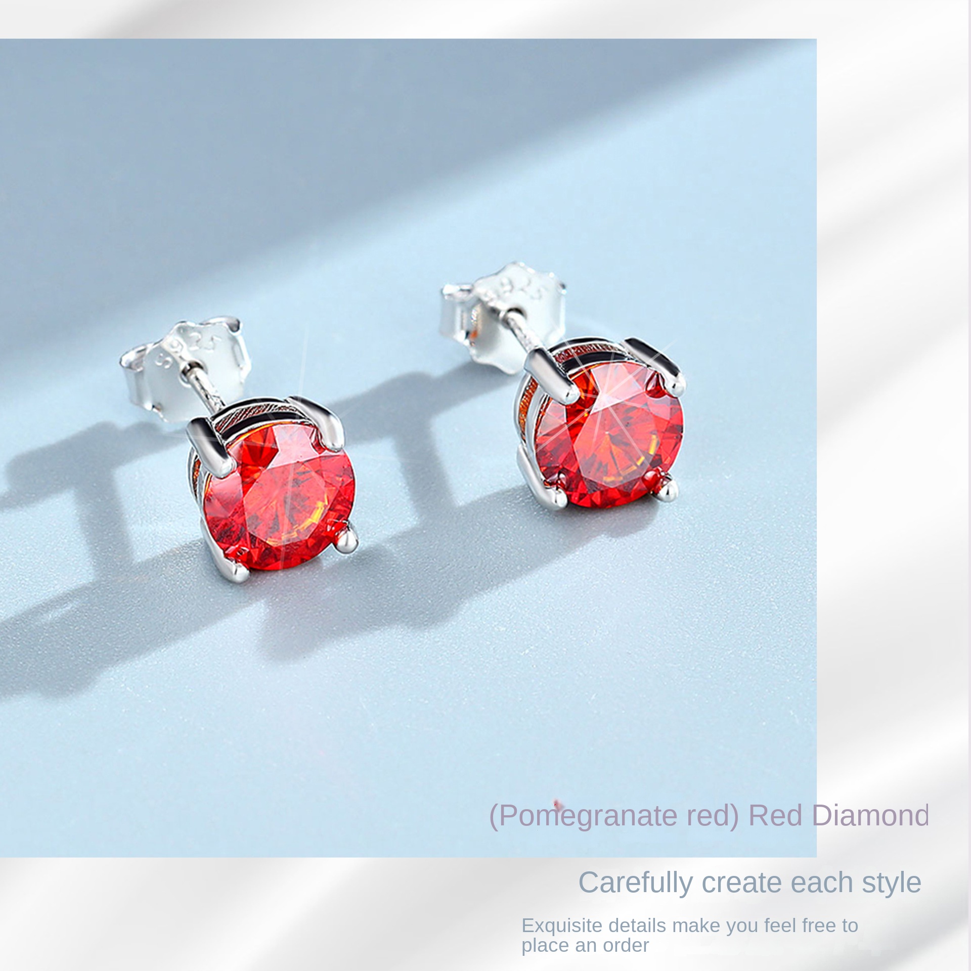 Four jaw Mossan stud earrings