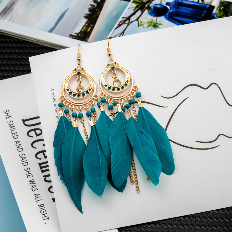 Long Bohemian fringe feather earrings