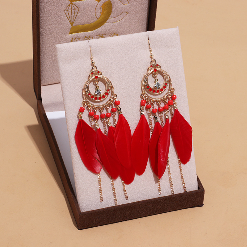 Long Bohemian fringe feather earrings