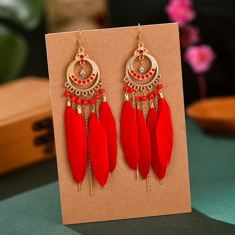 Long Bohemian fringe feather earrings