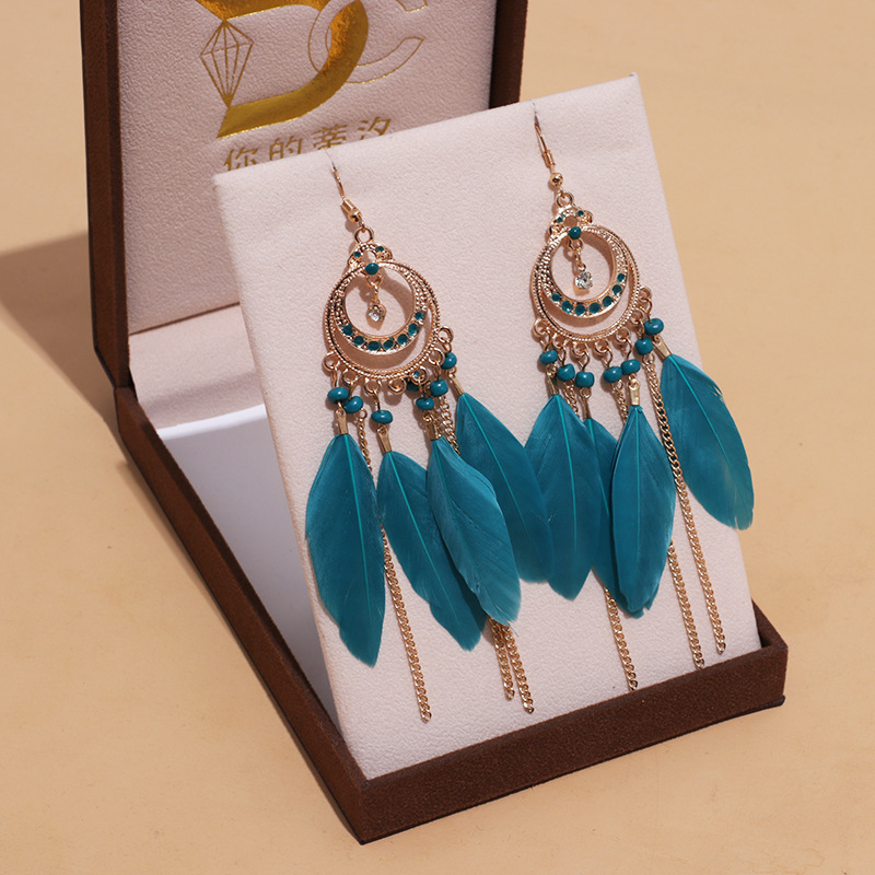 Long Bohemian fringe feather earrings