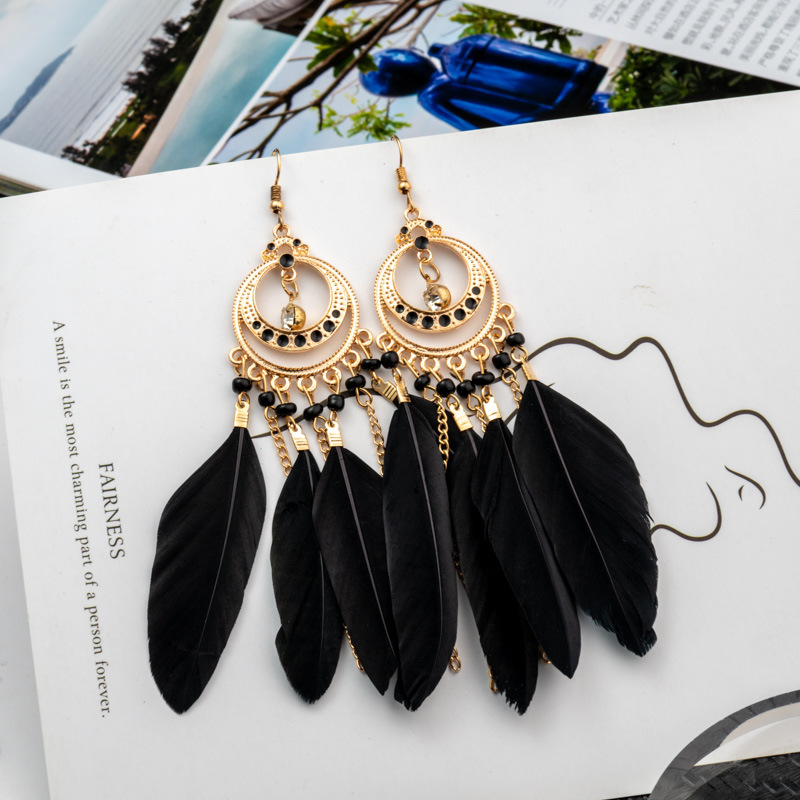 Long Bohemian fringe feather earrings