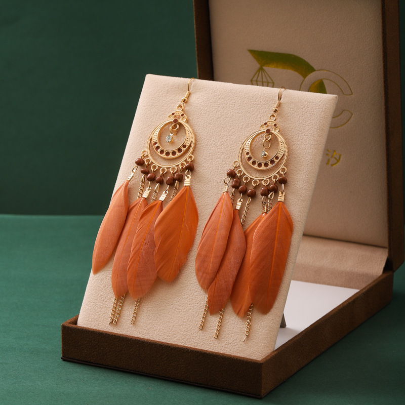 Long Bohemian fringe feather earrings