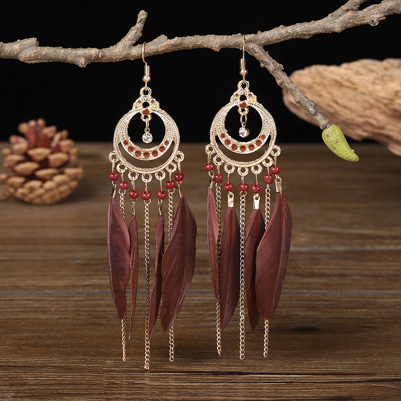 Long Bohemian fringe feather earrings