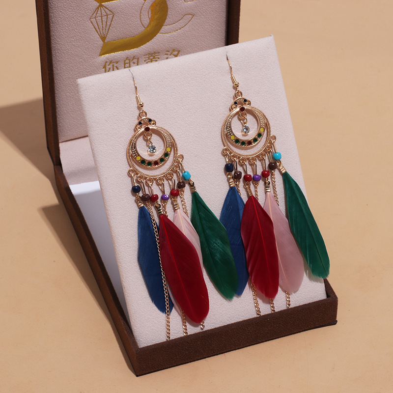 Long Bohemian fringe feather earrings
