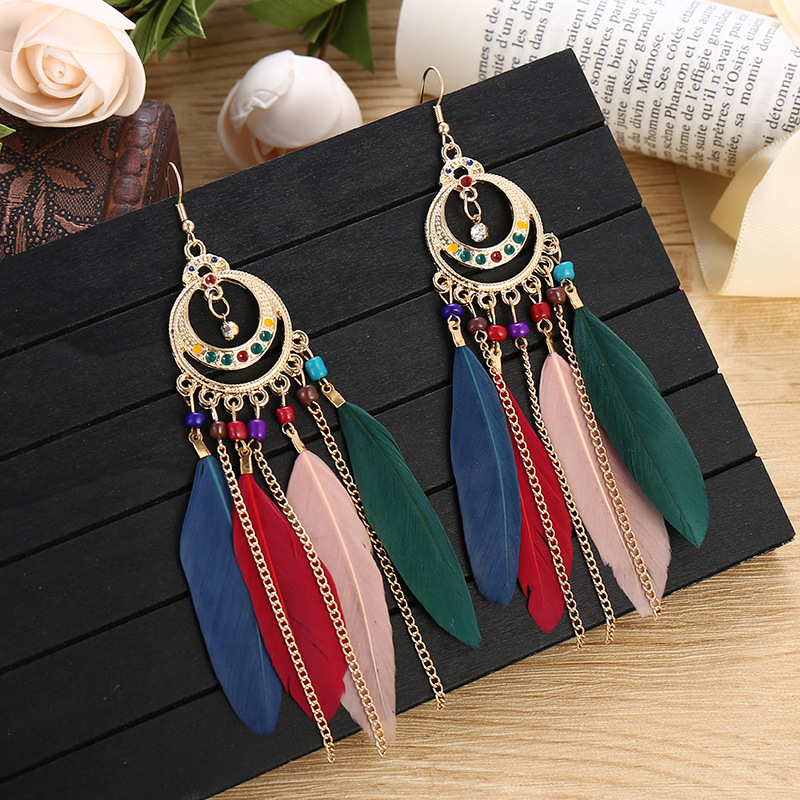 Long Bohemian fringe feather earrings