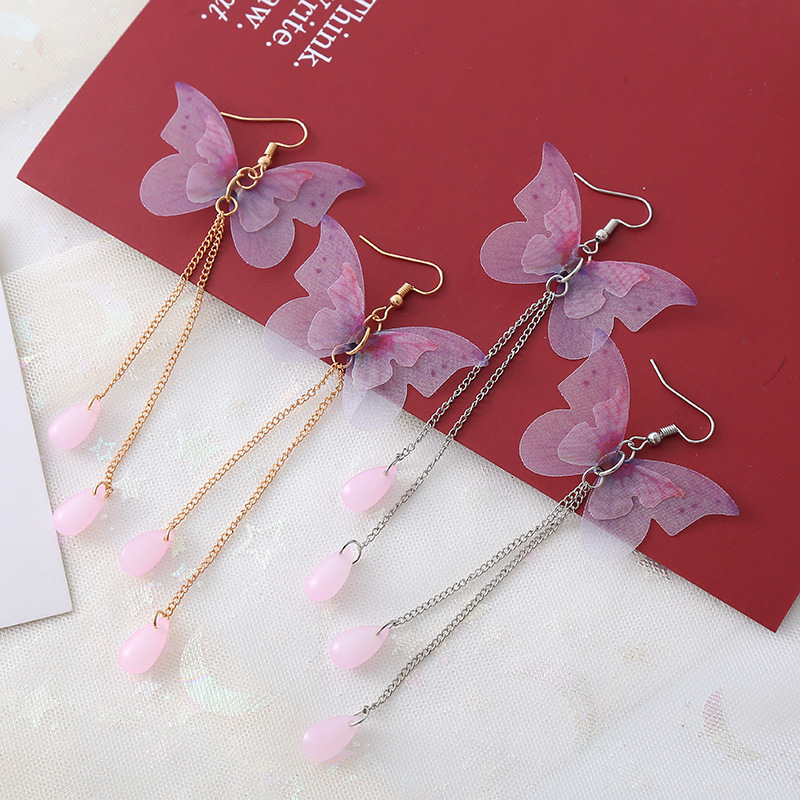Simple purple butterfly earrings