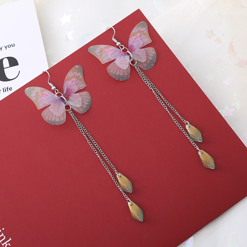 Simple purple butterfly earrings