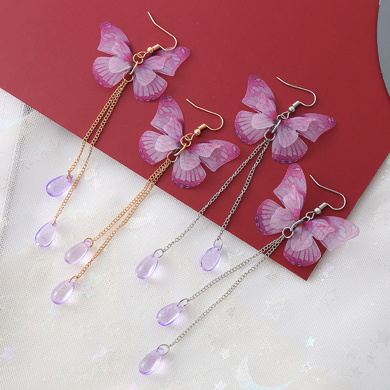 Simple purple butterfly earrings