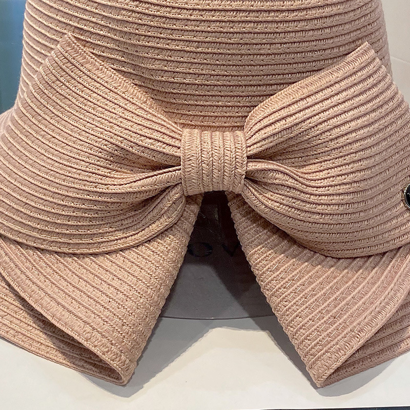 Beach hat with large brim and bow