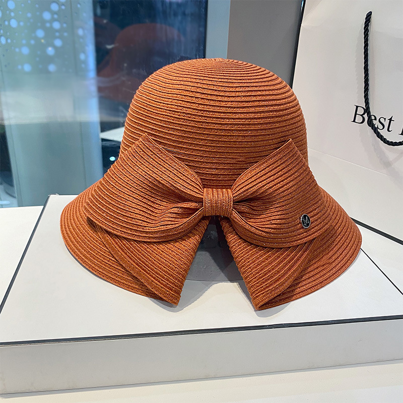 Beach hat with large brim and bow