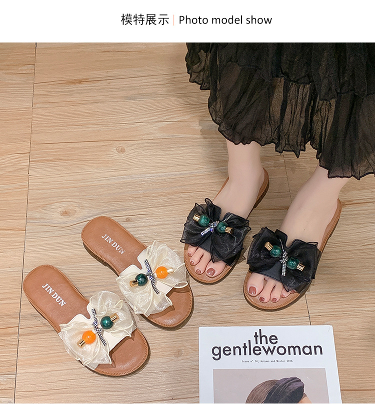 Beach slippers with bow on beef tendon sole
