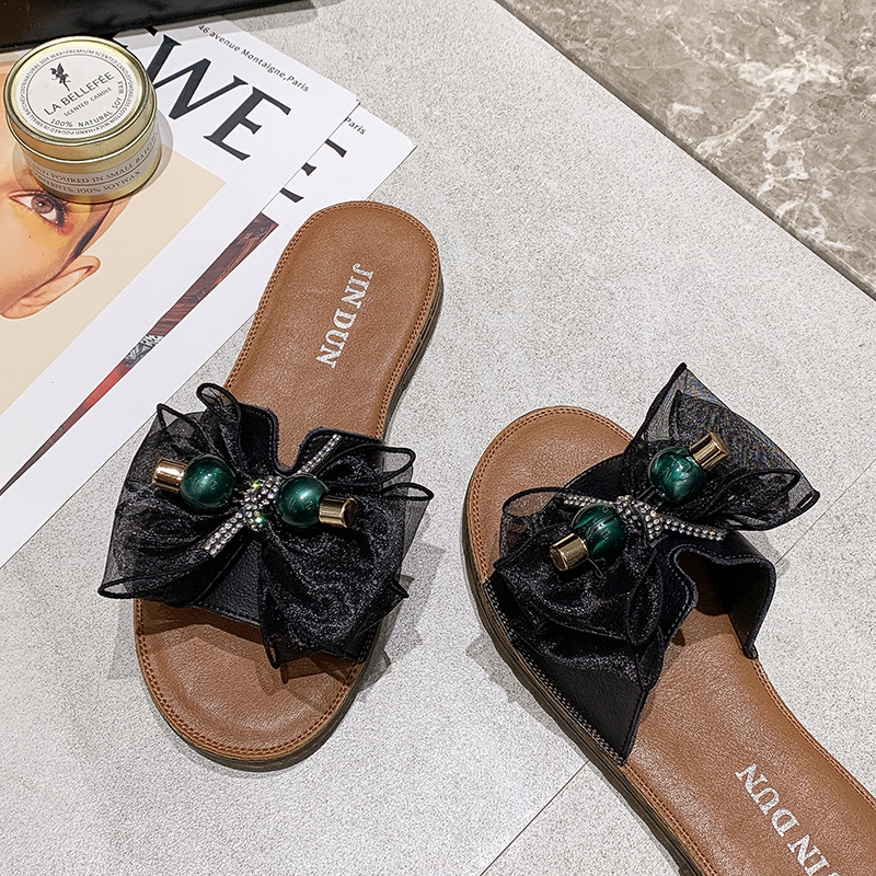 Beach slippers with bow on beef tendon sole
