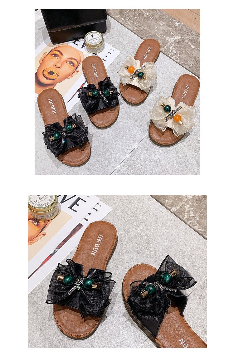 Beach slippers with bow on beef tendon sole