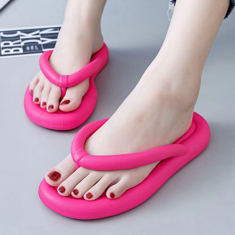 Cute doll with flip-flops