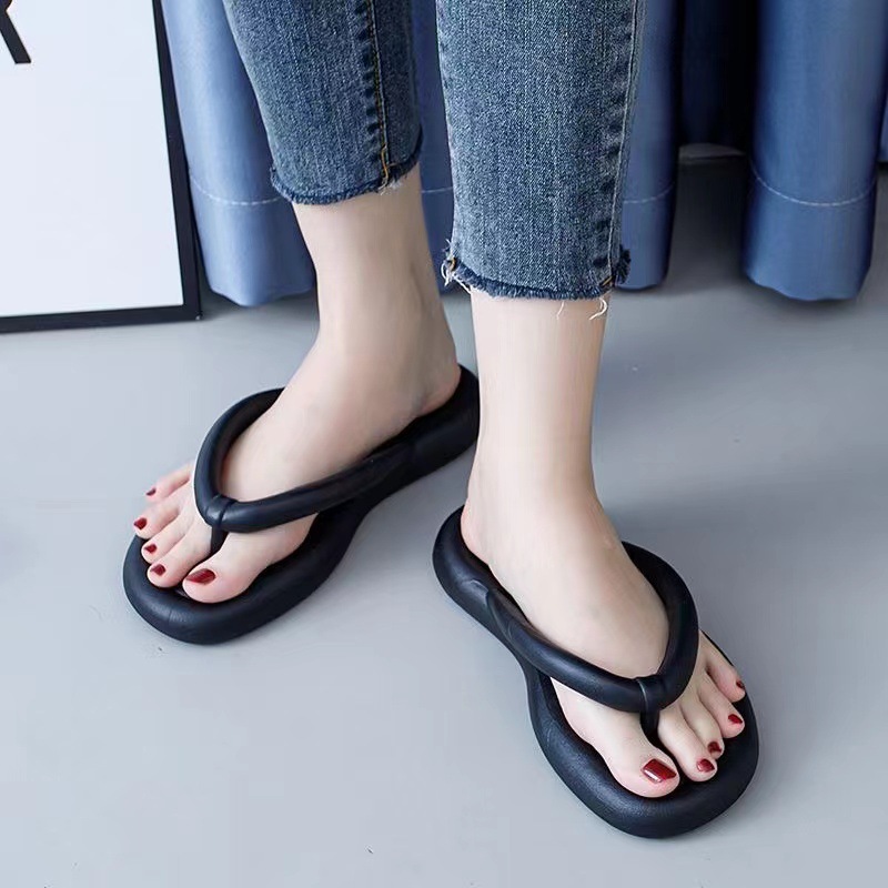 Cute doll with flip-flops