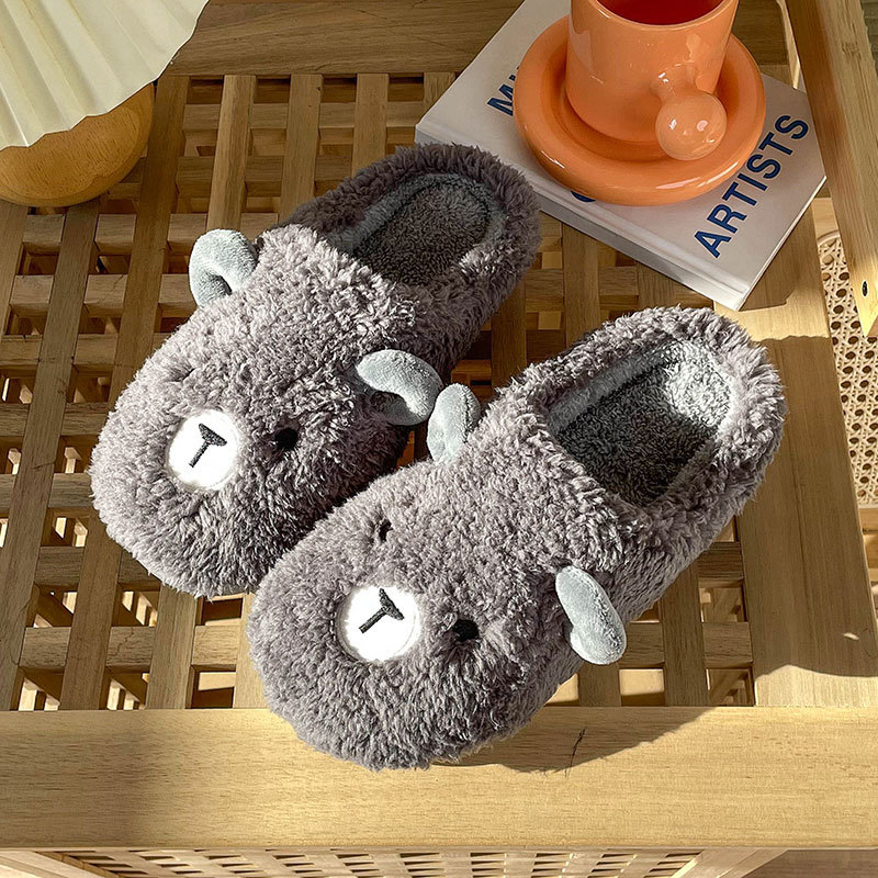 Non-slip thick soled warm couple soft soled month shoes