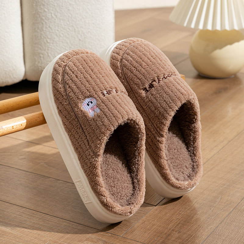Non-slip thick soled warm couple soft soled month shoes