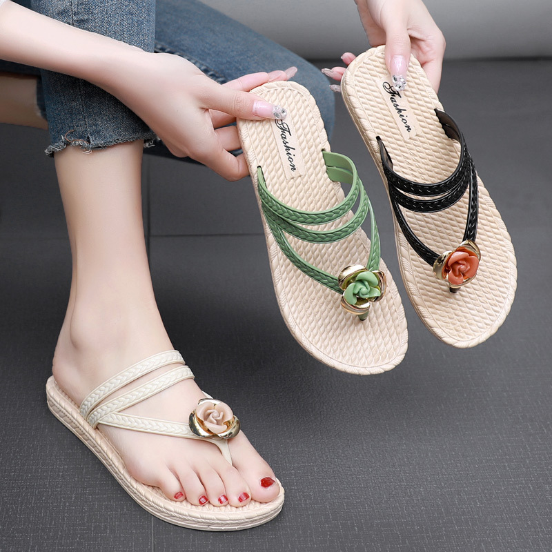 Plastic flip-flops with flowers