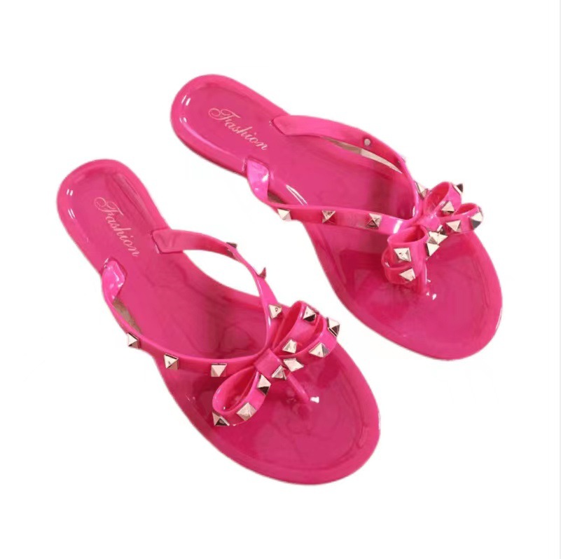 Studded bow flip-flops