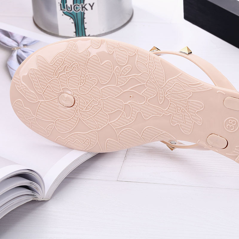 Studded bow flip-flops