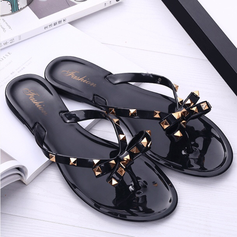 Studded bow flip-flops