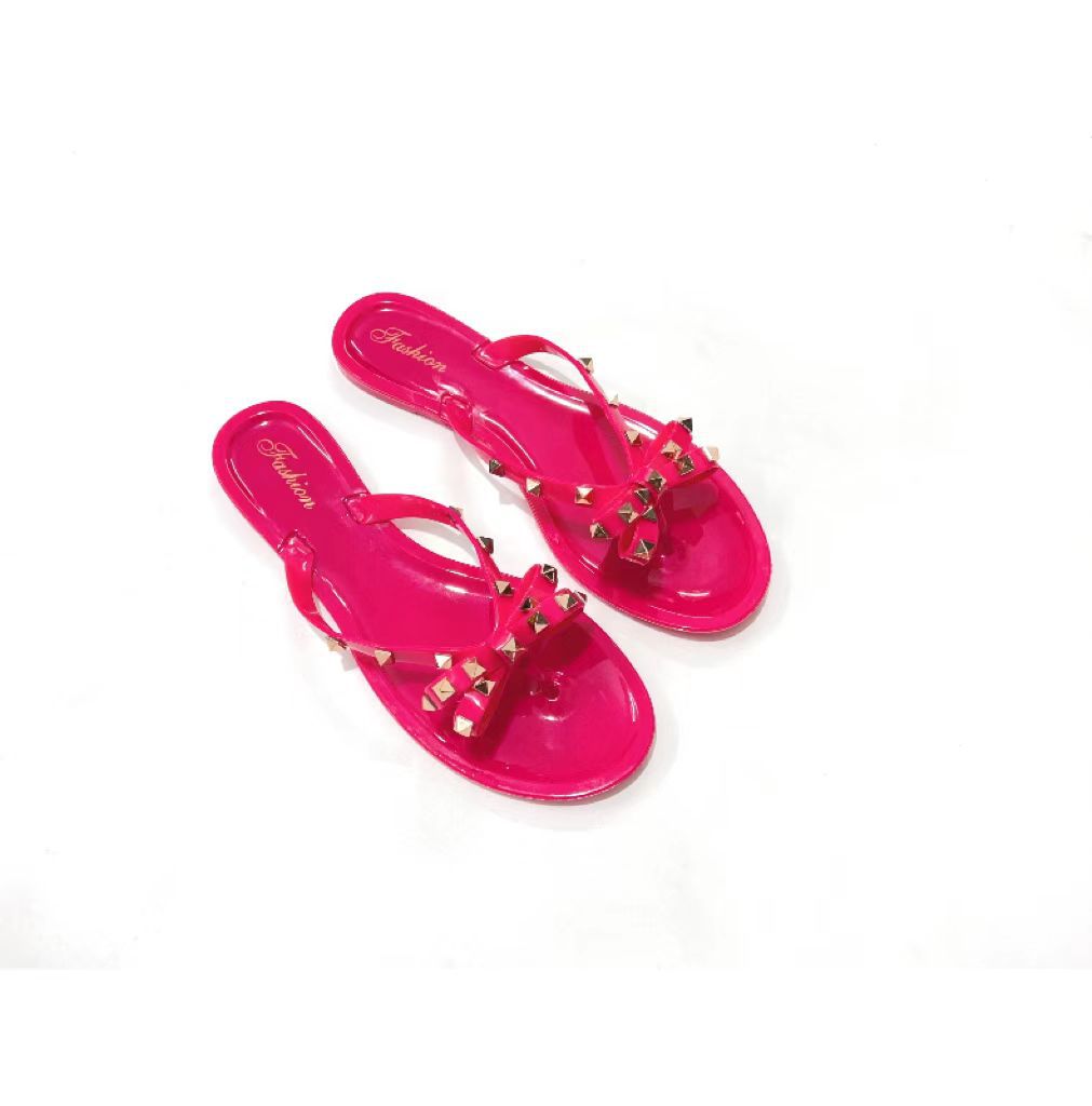 Studded bow flip-flops