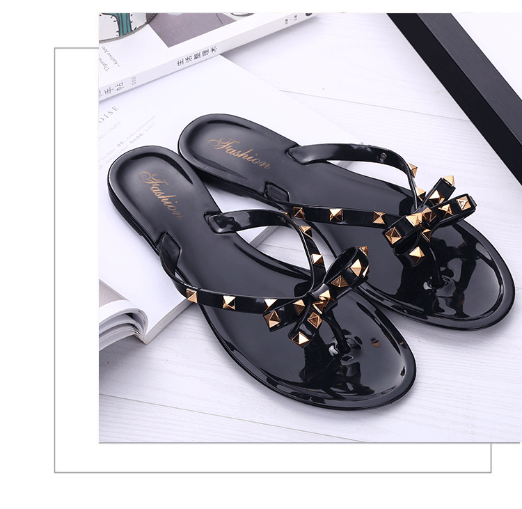 Studded bow flip-flops