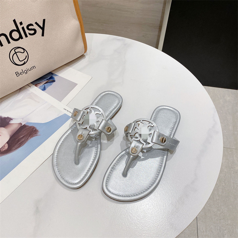 Wear flat beach slippers